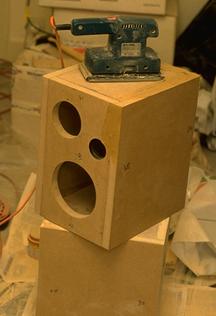 Sanding speaker boxes; JPG 10kB